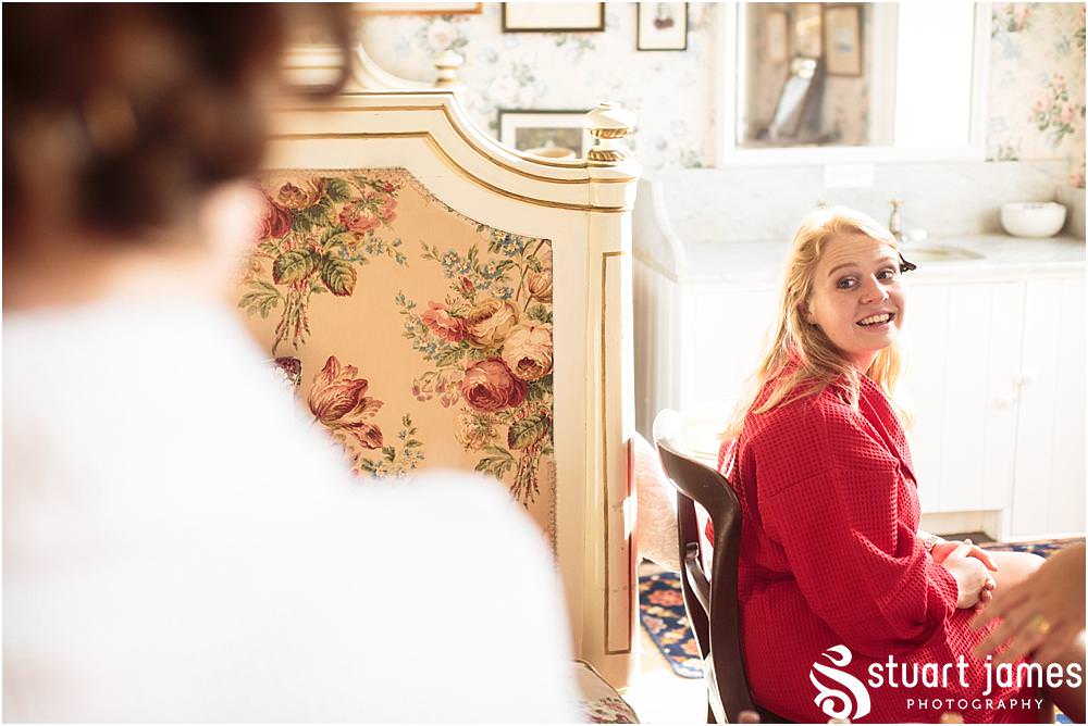 Documenting the bridal preparations ahead of the wedding at All Saints Church, Sandon Hall in Stafford by Sandon Wedding Photographers Stuart James