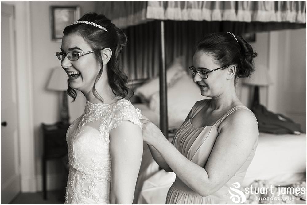 Dressed to perfection, our Bride looking amazing in her gown from Brides of Chester, ready for the wedding at All Saints Church, Sandon Hall in Stafford by Sandon Wedding Photographers Stuart James