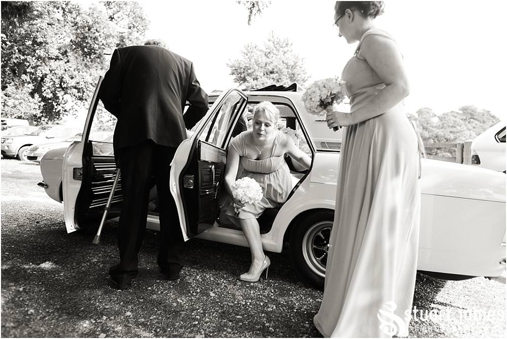 Capturing the arrival of our bride for the wedding at All Saints Church, Sandon Hall in Stafford by Sandon Wedding Photographers Stuart James