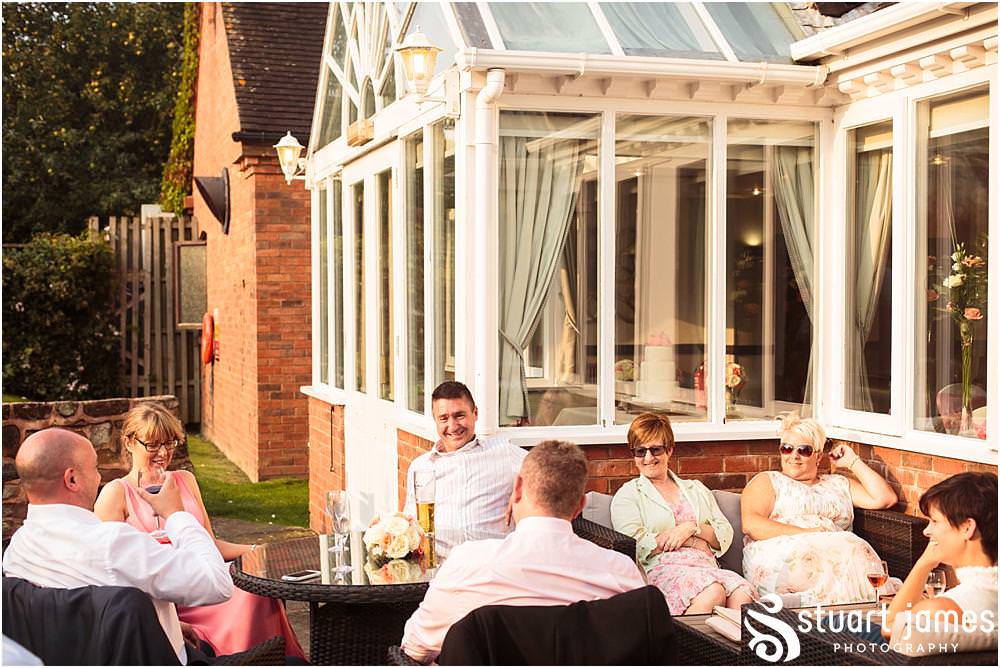 Capturing the wonderful reception as the guests enjoy the wedding evening at The Moat House in Acton Trussell by Wedding Photographer Penkridge - Documentary Wedding Photographer Stuart James
