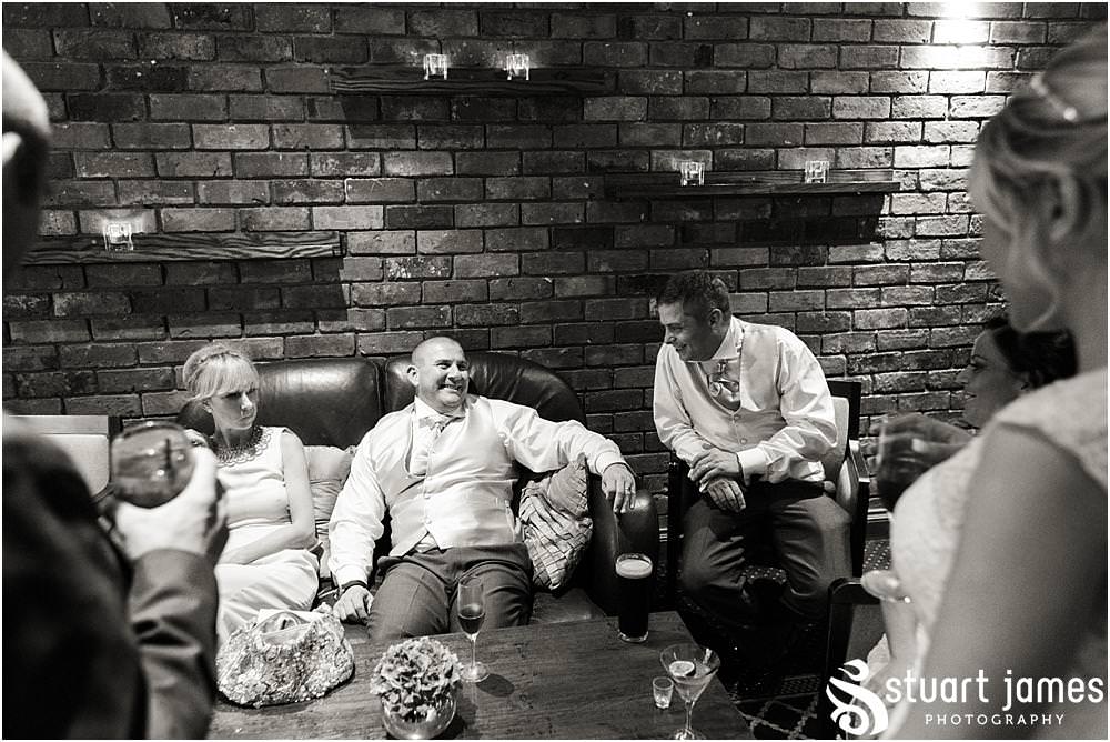 Capturing the wonderful reception as the guests enjoy the wedding evening at The Moat House in Acton Trussell by Wedding Photographer Penkridge - Documentary Wedding Photographer Stuart James