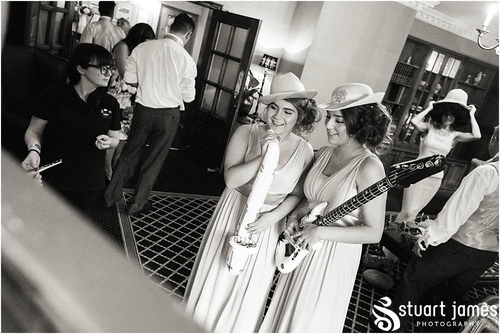Capturing the wonderful reception as the guests enjoy the wedding evening at The Moat House in Acton Trussell by Wedding Photographer Penkridge - Documentary Wedding Photographer Stuart James