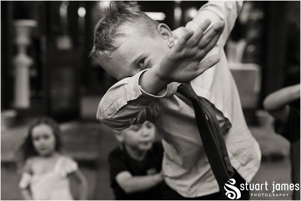 Capturing the wonderful reception as the guests enjoy the wedding evening at The Moat House in Acton Trussell by Wedding Photographer Penkridge - Documentary Wedding Photographer Stuart James