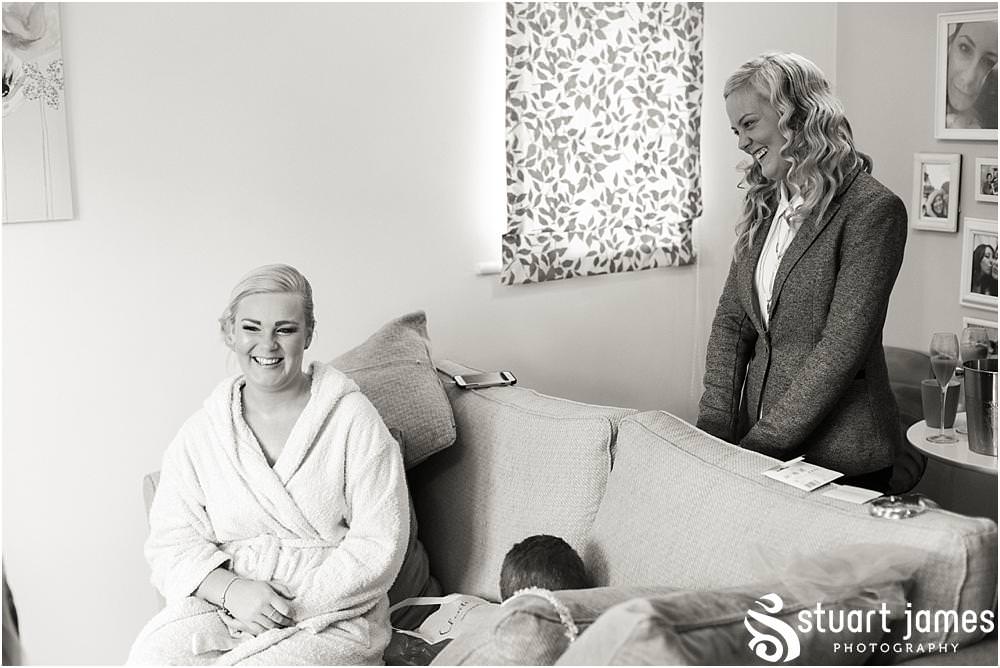 Natural photos that show the excitement building for the wedding party ahead of the wedding at Hundred House in Norton, Telford - Hundred House Wedding Photography by Documentary Wedding Photographer Stuart James