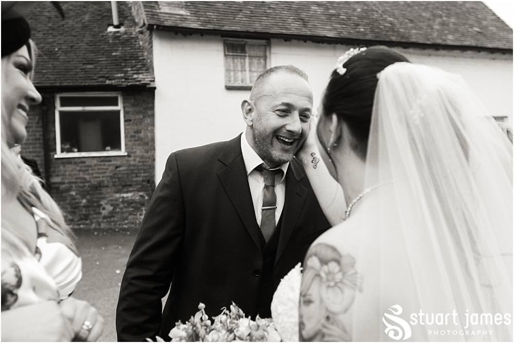 Beautiful moments to capture as the couple are greeted by their guests at The Hundred House in Norton, Telford - Hundred House Wedding Photography by Documentary Wedding Photographer Stuart James