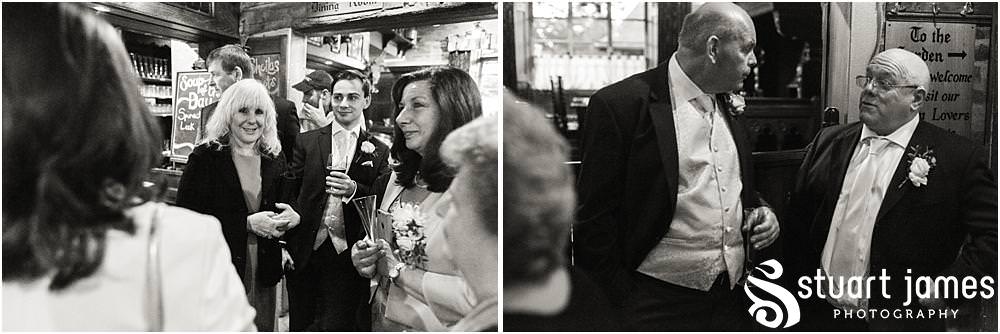 Creative candid moments captured as the guests enjoy the drinks reception at The Hundred House in Norton, Telford - Hundred House Wedding Photography by Documentary Wedding Photographer Stuart James