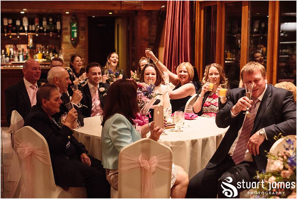 Candid photos capturing the wonderful mood of the evening as the evening guests arrive ready to party the night away at The Hundred House in Norton, Telford - Hundred House Wedding Photography by Documentary Wedding Photographer Stuart James