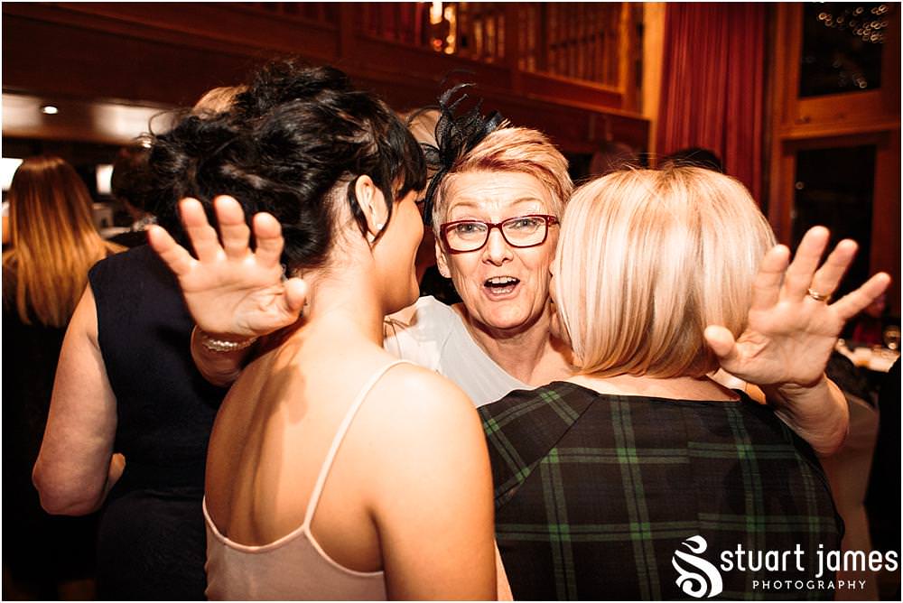 Candid photos capturing the wonderful mood of the evening as the evening guests arrive ready to party the night away at The Hundred House in Norton, Telford - Hundred House Wedding Photography by Documentary Wedding Photographer Stuart James