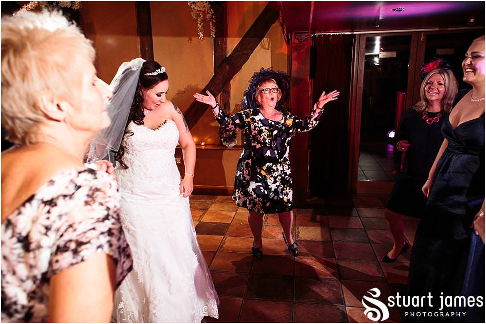 Photographing the wedding from the inside out, as the party of the century gets underway at The Hundred House in Norton, Telford - Hundred House Wedding Photography by Documentary Wedding Photographer Stuart James