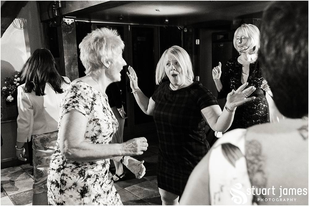 Photographing the wedding from the inside out, as the party of the century gets underway at The Hundred House in Norton, Telford - Hundred House Wedding Photography by Documentary Wedding Photographer Stuart James