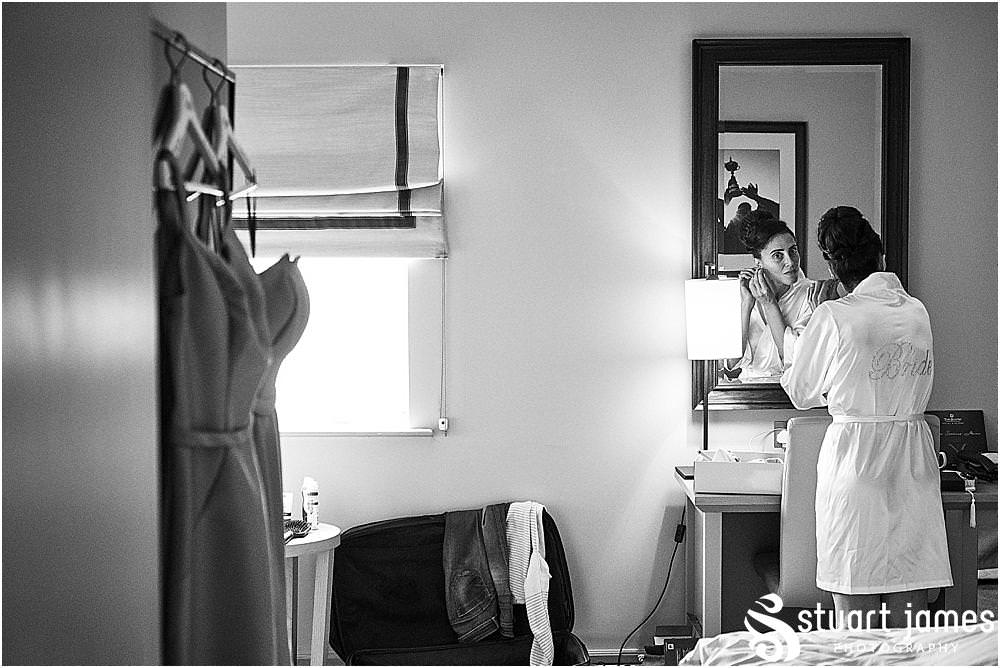 Creative photography of the morning preparations at The Belfry in Birmingham by Greek Wedding Photographer Birmingham Stuart James