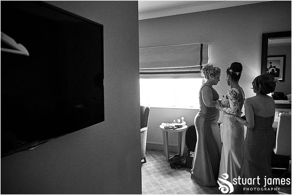 The emotions really built for our bride and bridal party as Kat dressed in her gown for the wedding at The Belfry in Birmingham by Greek Wedding Photographer Birmingham Stuart James
