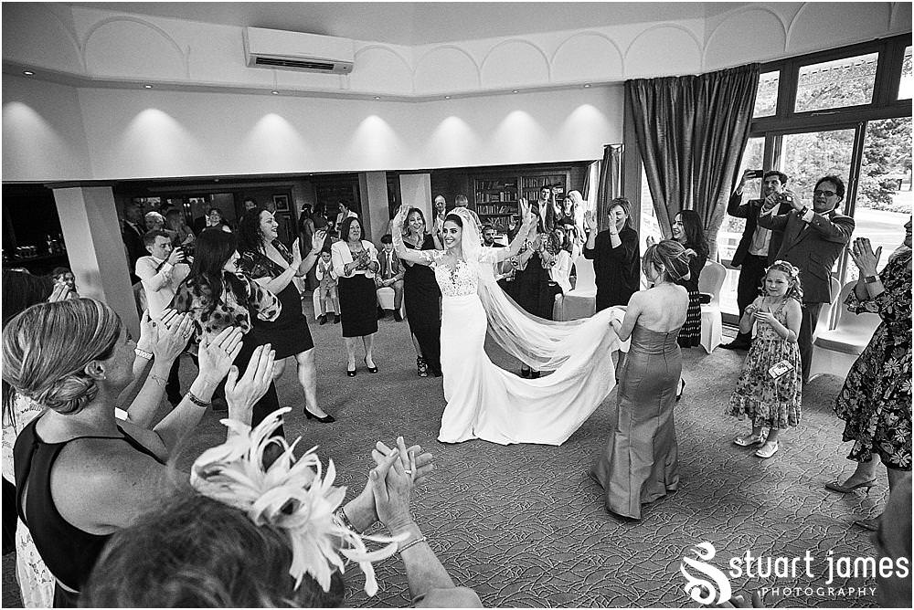 Beautiful moments for the brides family during the Stolisma ahead of the church ceremony and wedding at The Belfry in Birmingham by Greek Wedding Photographer Birmingham Stuart James