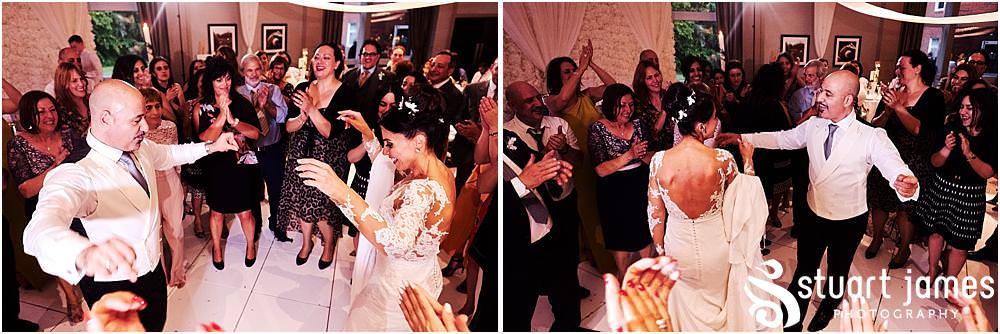 As the dancing gets underway, see the photos capturing the fabulous spirit at The Belfry in Birmingham by Greek Wedding Photographer Birmingham Stuart James