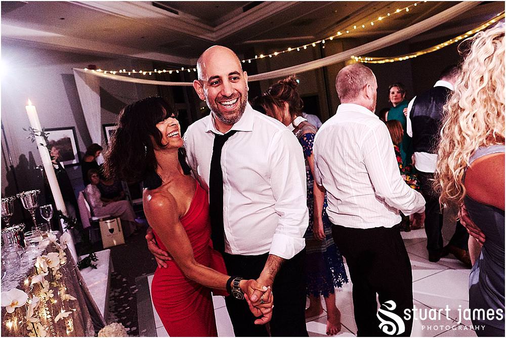 With the floor filled from the start of the night, the scenes on the dance floor were fabulous to capture at The Belfry in Birmingham by Greek Wedding Photographer Birmingham Stuart James