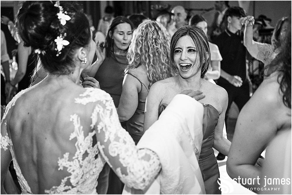 With greek dancing and amazing music, this was one fabulous party at The Belfry in Birmingham by Greek Wedding Photographer Birmingham Stuart James