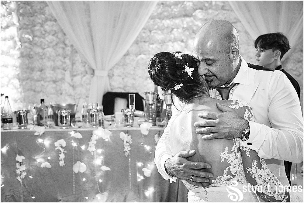 From being flung around the dance floor to being held in an embrace, this was an incredible night for our bride at The Belfry in Birmingham by Greek Wedding Photographer Birmingham Stuart James