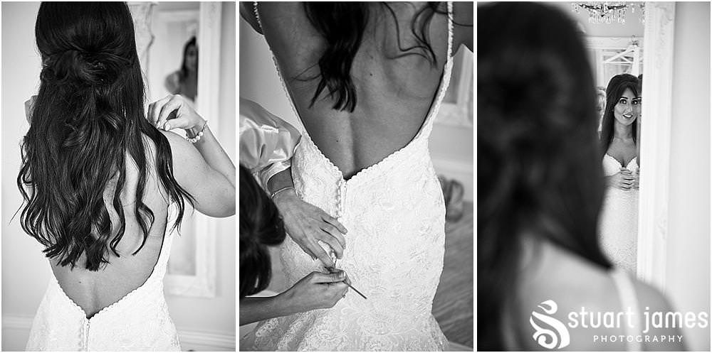 Creative photographs of the beautiful moment the bride dresses in her gown at Hawkesyard Estate in Rugeley by Documentary Wedding Photographer Stuart James