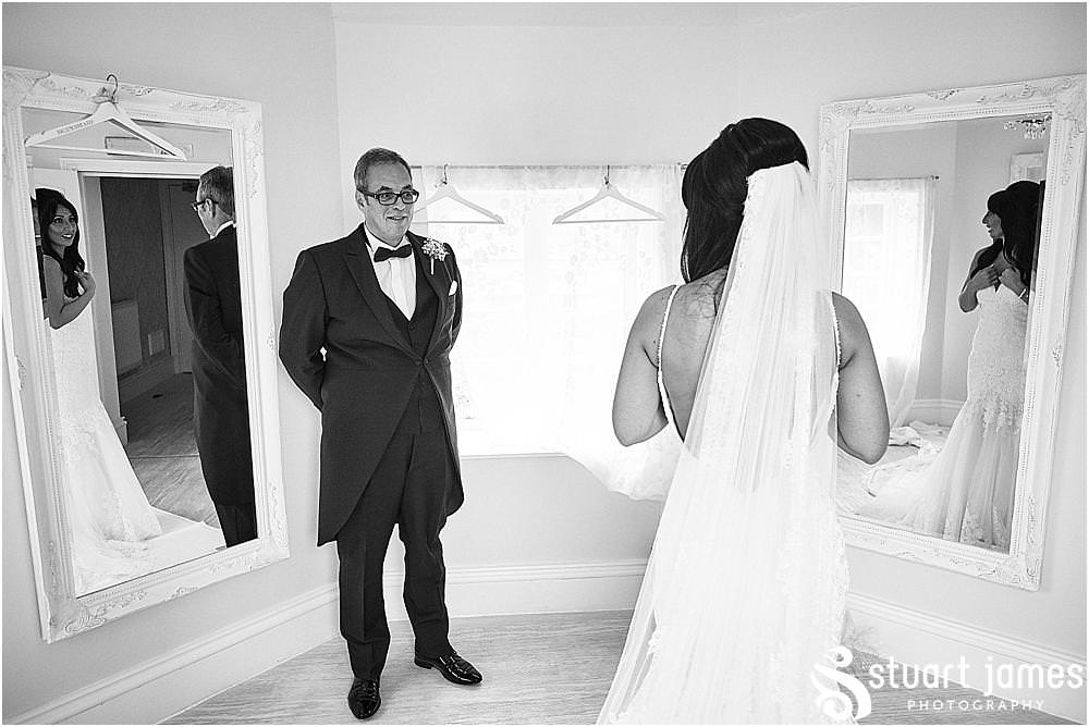 Beautiful moment to capture as the father sees his beautiful daughter as the bride for the first time at Hawkesyard Estate in Rugeley by Documentary Wedding Photographer Stuart James