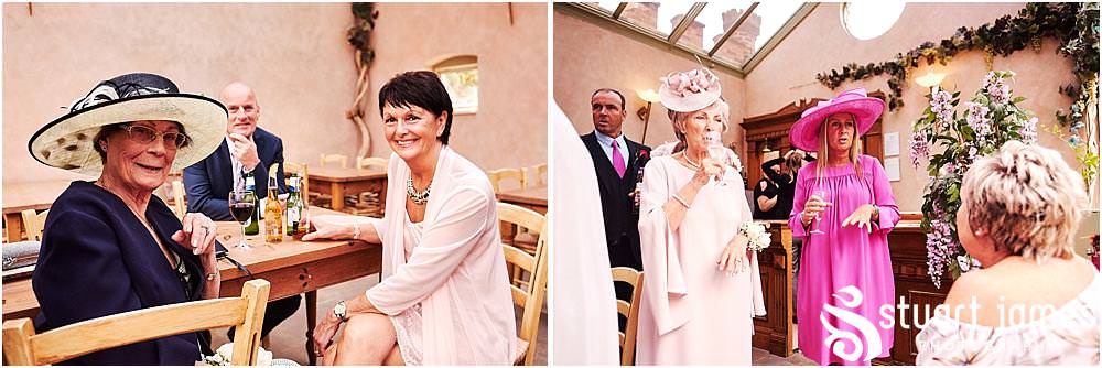 Creative candid photographs as the guests assemble for the day ahead at Hawkesyard Estate in Rugeley by Documentary Wedding Photographer Stuart James