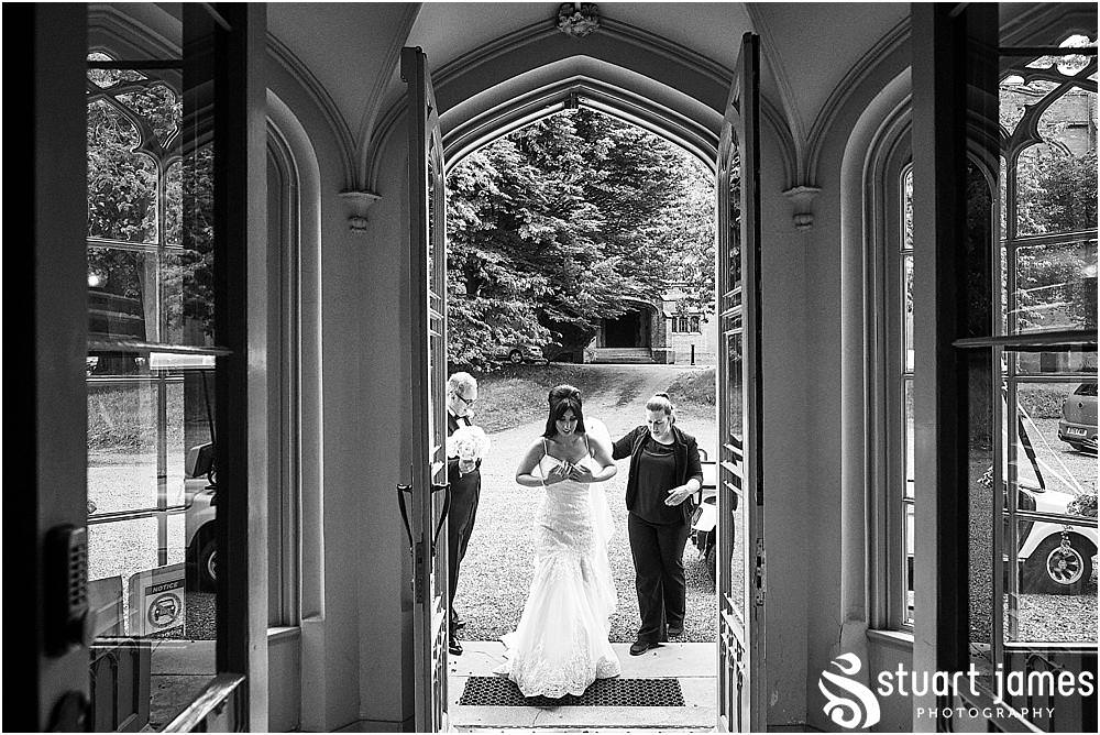 As the bridal party arrives for the ceremony, the mood of excitement built at Hawkesyard Estate in Rugeley by Documentary Wedding Photographer Stuart James