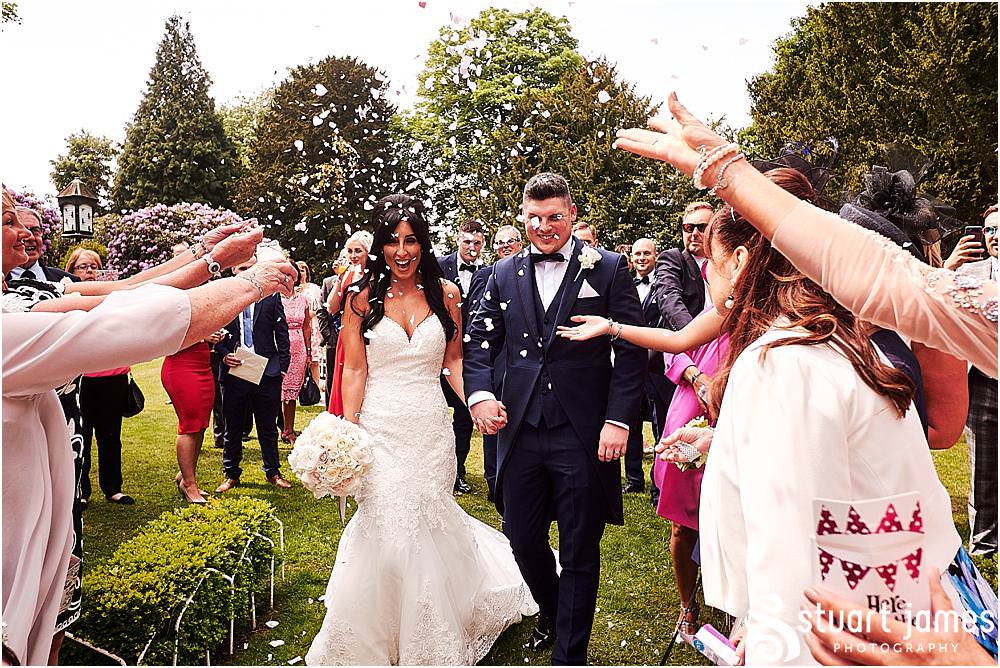 Relaxed natural photography during the afternoon receptions on the lawns at Hawkesyard Estate in Rugeley by Documentary Wedding Photographer Stuart James