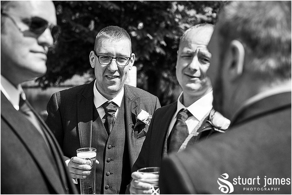 Candid photos of the guests relaxing and enjoying the wedding reception at The Moat House in Stafford | Moat House Wedding Photographs by Documentary Wedding Photographer Stuart James