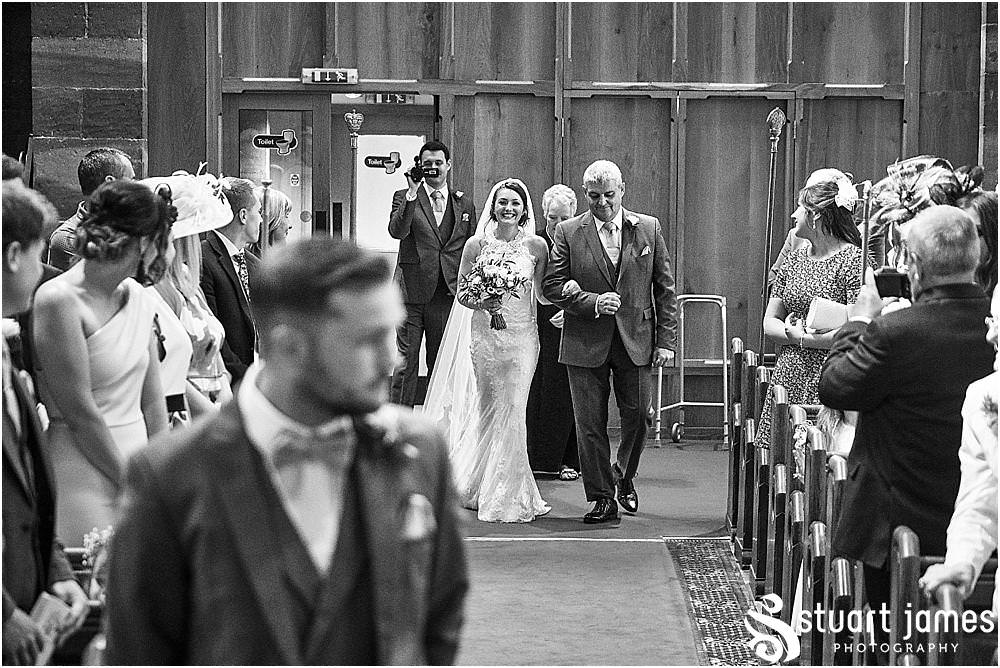 The smile says it all as Jess walks down the aisle at St Michaels Church in Penkridge by Penkridge Wedding Photographer Staffordshire Stuart James