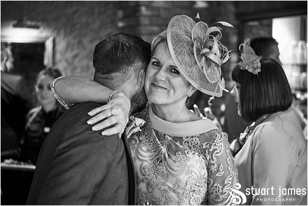 Relaxed natural candid photographs capturing the character of the guests as they enjoy the wedding reception at The Moat House
