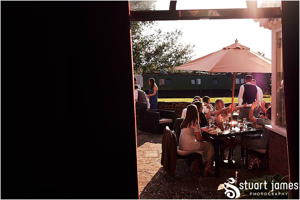 Candid photos showing the guests enjoying the most perfect time at The Moat House in Acton Trussell by Penkridge Wedding Photographer Staffordshire Stuart James
