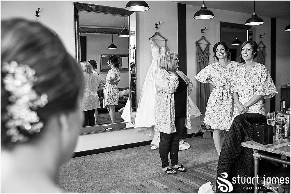 Unobtrusive photos that capture the excitement of the morning during the preparations at The Mill Barns photos by Mill Barns Wedding Photographer Stuart James