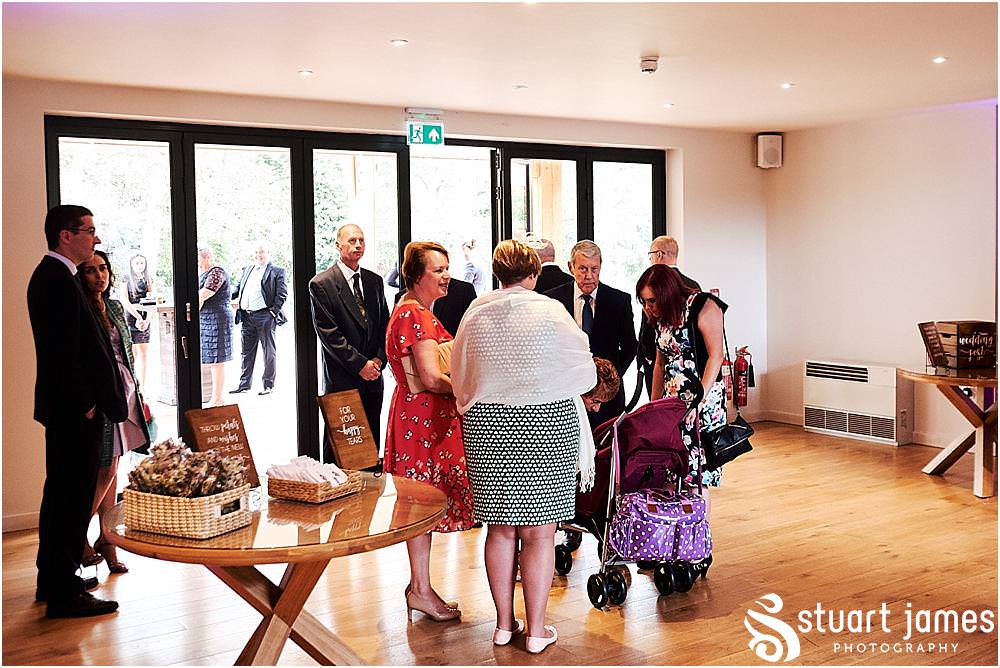 Candid photographs as the guests arrive and enjoy the stunning setting of The Mill Barns photos by Mill Barns Wedding Photographer Stuart James - the excitement for the wedding was seriously building!