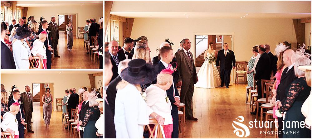 Capturing the procession of the Bridal Party into the ceremony room for the wedding at The Mill Barns photos by Mill Barns Wedding Photographer Stuart James