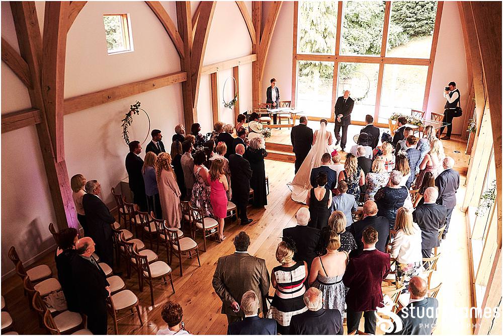 Capturing the procession of the Bridal Party into the ceremony room for the wedding at The Mill Barns photos by Mill Barns Wedding Photographer Stuart James