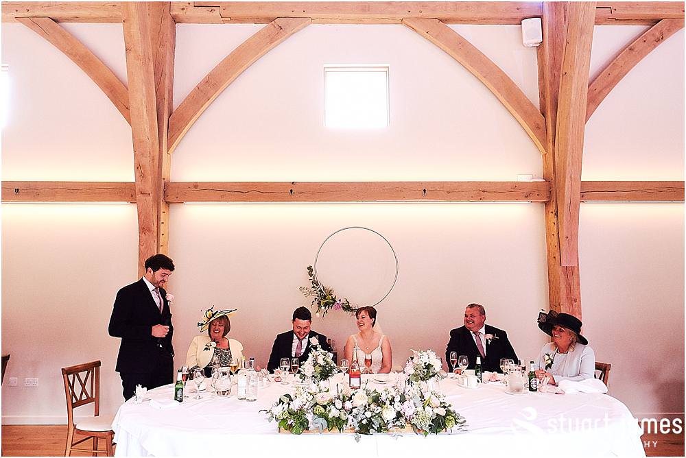 Capturing the reactions of the guests to the speeches, each photo telling a fabulous little story at The Mill Barns photos by Mill Barns Wedding Photographer Stuart James