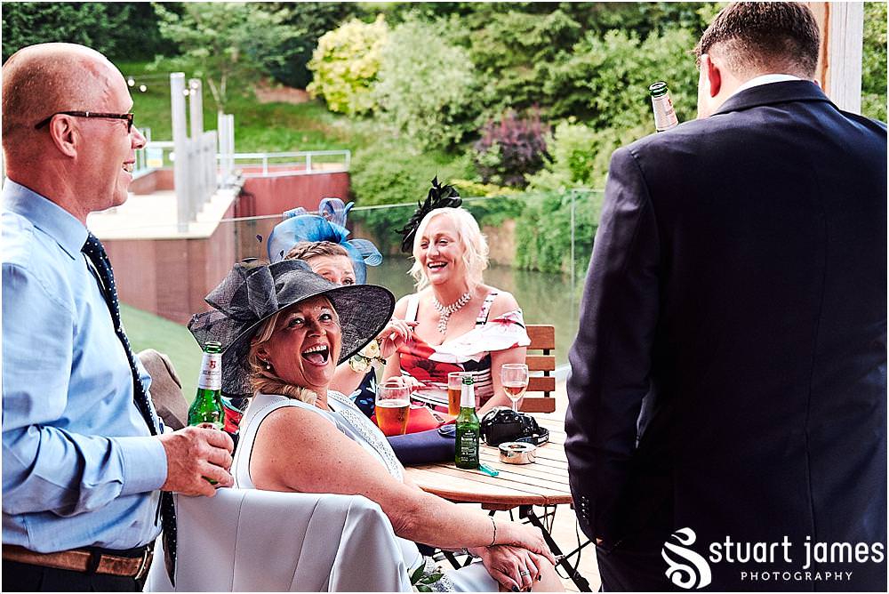 Creative reportage photographs as the guests relax and enjoy the evening at The Mill Barns ahead of the party - Mill Barns Wedding Photographer Stuart James