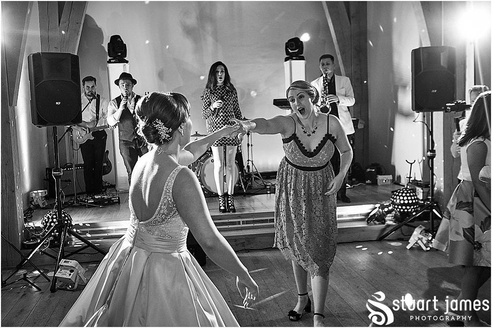 Capturing the very essence of the wedding party as the guests let loose on the floor - Mill Barns Wedding Photographer Stuart James