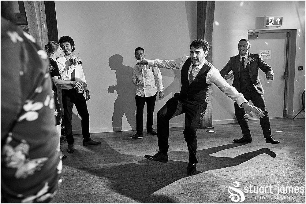 Capturing the very essence of the wedding party as the guests let loose on the floor - Mill Barns Wedding Photographer Stuart James