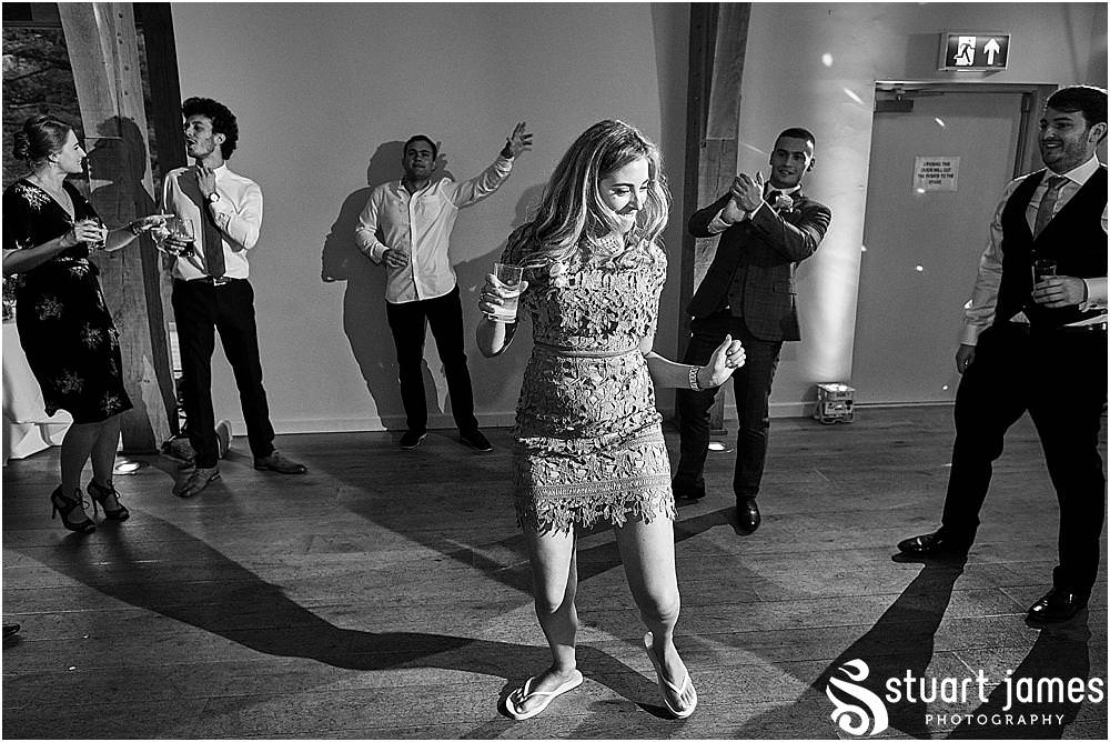 Capturing the wedding from the inside out, right in the mix of the action on the dancefloor with Mill Barns Wedding Photographer Stuart James