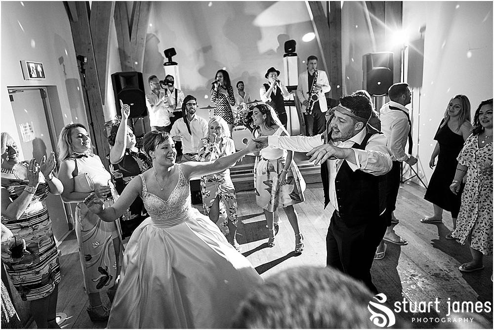 Capturing the real life and story of the night as the party gets into full swing - Mill Barns Wedding Photographer Stuart James