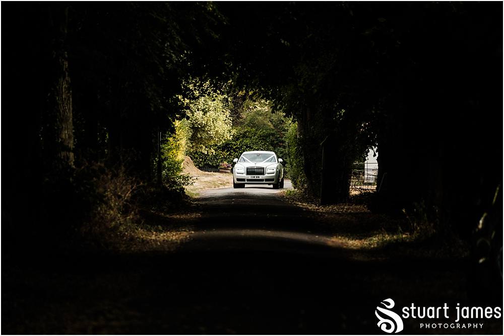 Arriving in style, our bride looking truly perfect for her wedding at St Marys Church - Newton Solney Wedding Photographer Stuart James