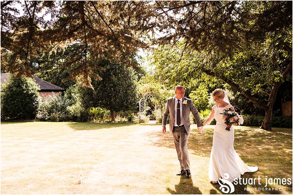 Creative elegant portraits of the bride and groom in the beautiful gardens at the house - Newton Solney Wedding Photographer Stuart James