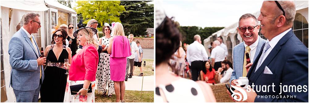 Capturing the true feel of the wedding as the guests relax and enjoy the drinks reception - Newton Solney Wedding Photographer Stuart James