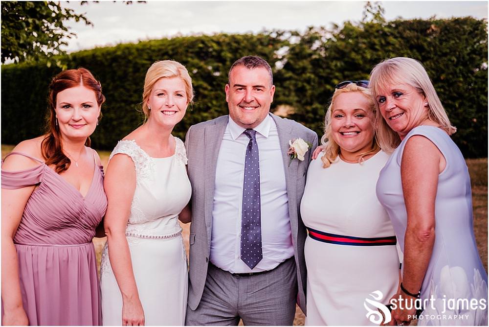 Natural reportage photos as the guests enjoy the stunning setting for the marquee wedding near Burton upon Trent - Newton Solney Wedding Photographer Stuart James