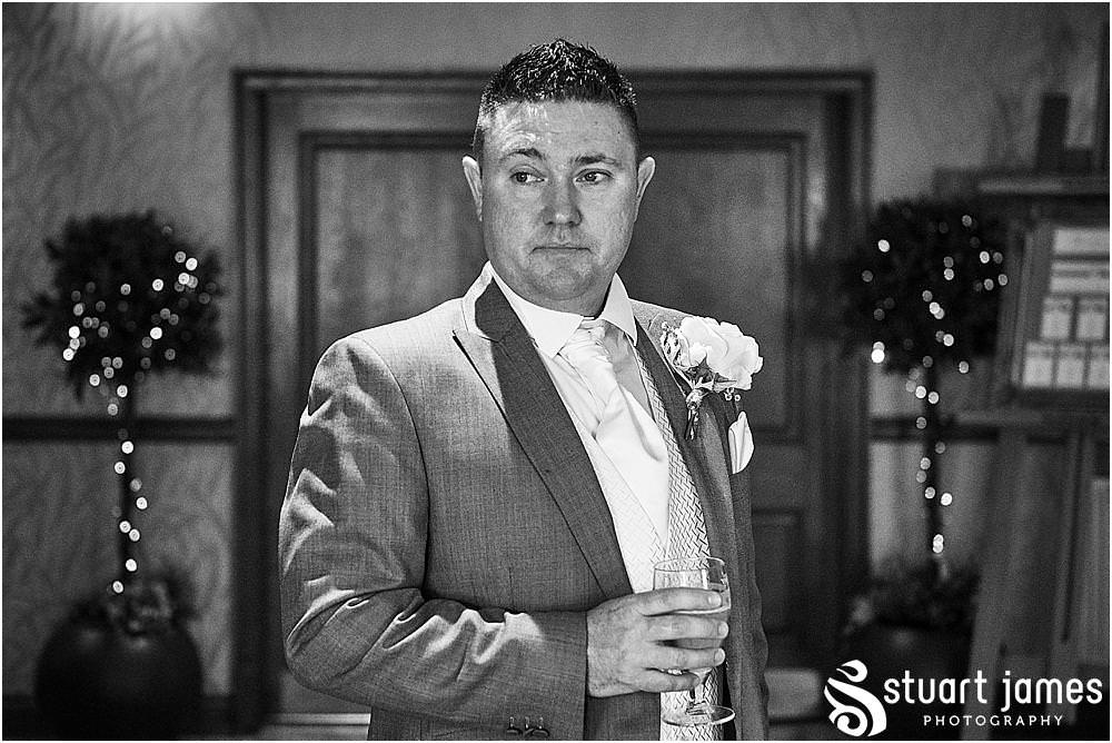 Creative candid photographs of the groomsmen and the guests arriving for the wedding at The Moat House in Acton Trussell by Penkridge Wedding Photographer Stuart James