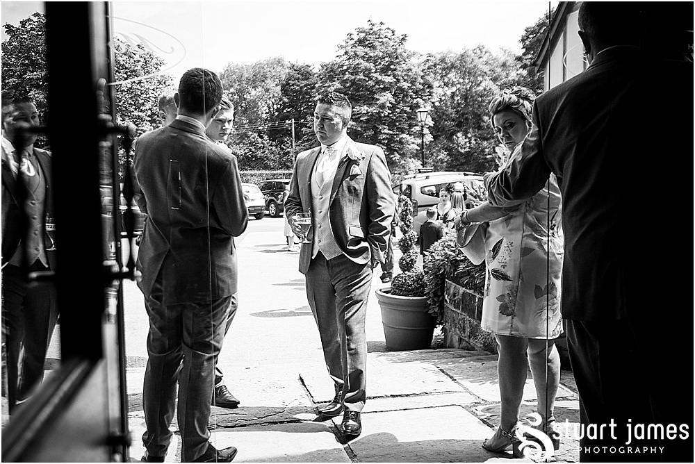 Creative candid photographs of the groomsmen and the guests arriving for the wedding at The Moat House in Acton Trussell by Penkridge Wedding Photographer Stuart James