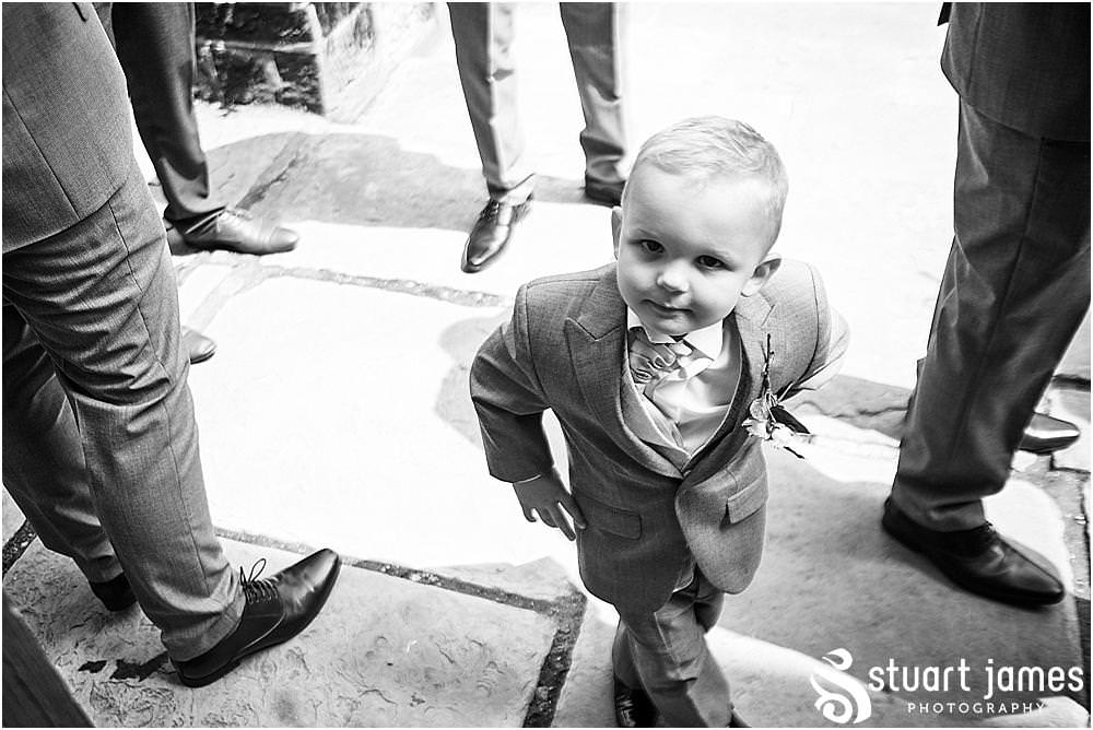 Creative candid photographs of the groomsmen and the guests arriving for the wedding at The Moat House in Acton Trussell by Penkridge Wedding Photographer Stuart James
