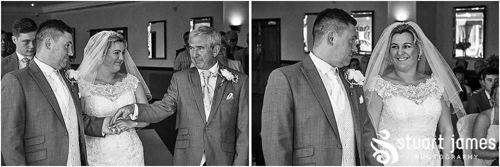 Photos that unobtrusively capture the story as the bride and groom wed in the Acton Suite at The Moat House in Acton Trussell by Penkridge Wedding Photographer Stuart James