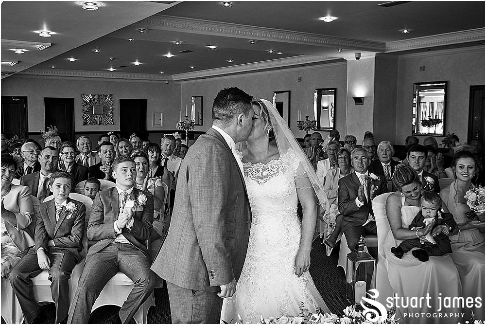 Photos that unobtrusively capture the story as the bride and groom wed in the Acton Suite at The Moat House in Acton Trussell by Penkridge Wedding Photographer Stuart James