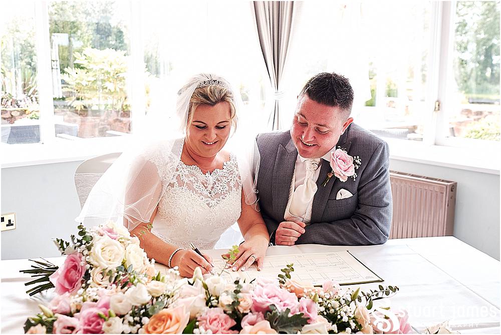 Unobtrusive natural photographs capturing the beautiful wedding ceremony at The Moat House in Acton Trussell by Penkridge Wedding Photographer Stuart James